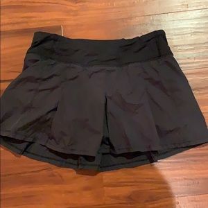 black lululemon golf or tennis skirt